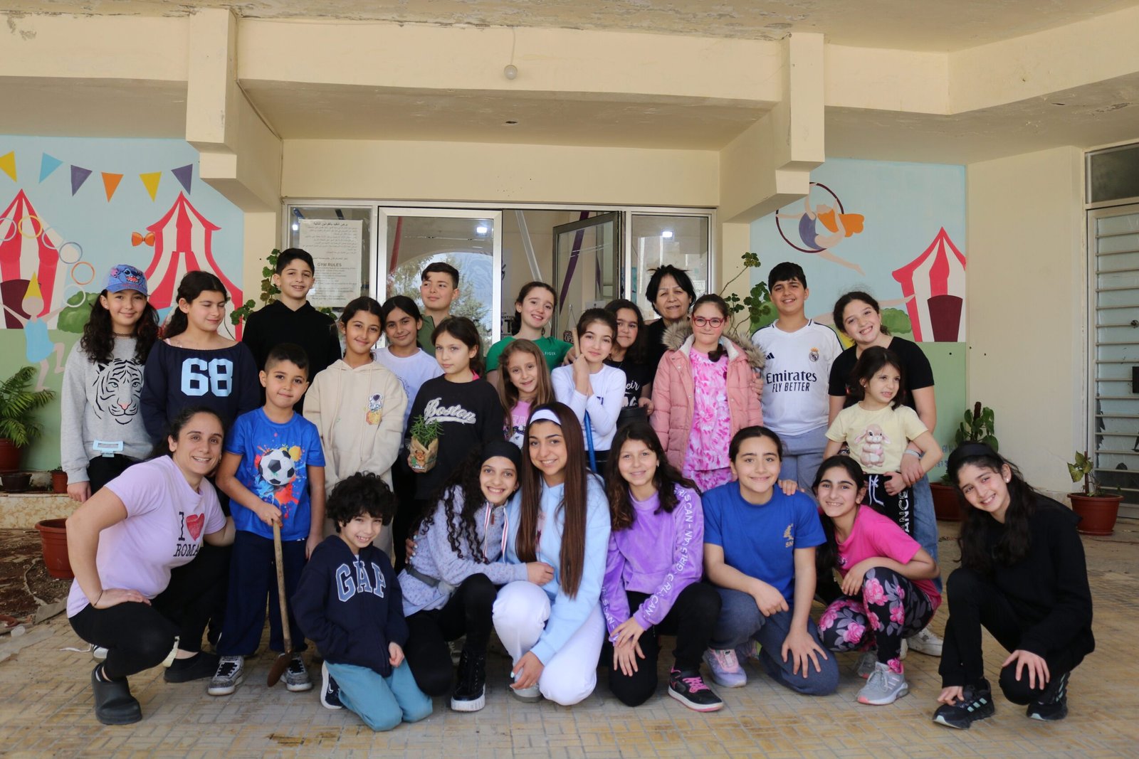 Group photo of circus students at Ciela Academy Baakline