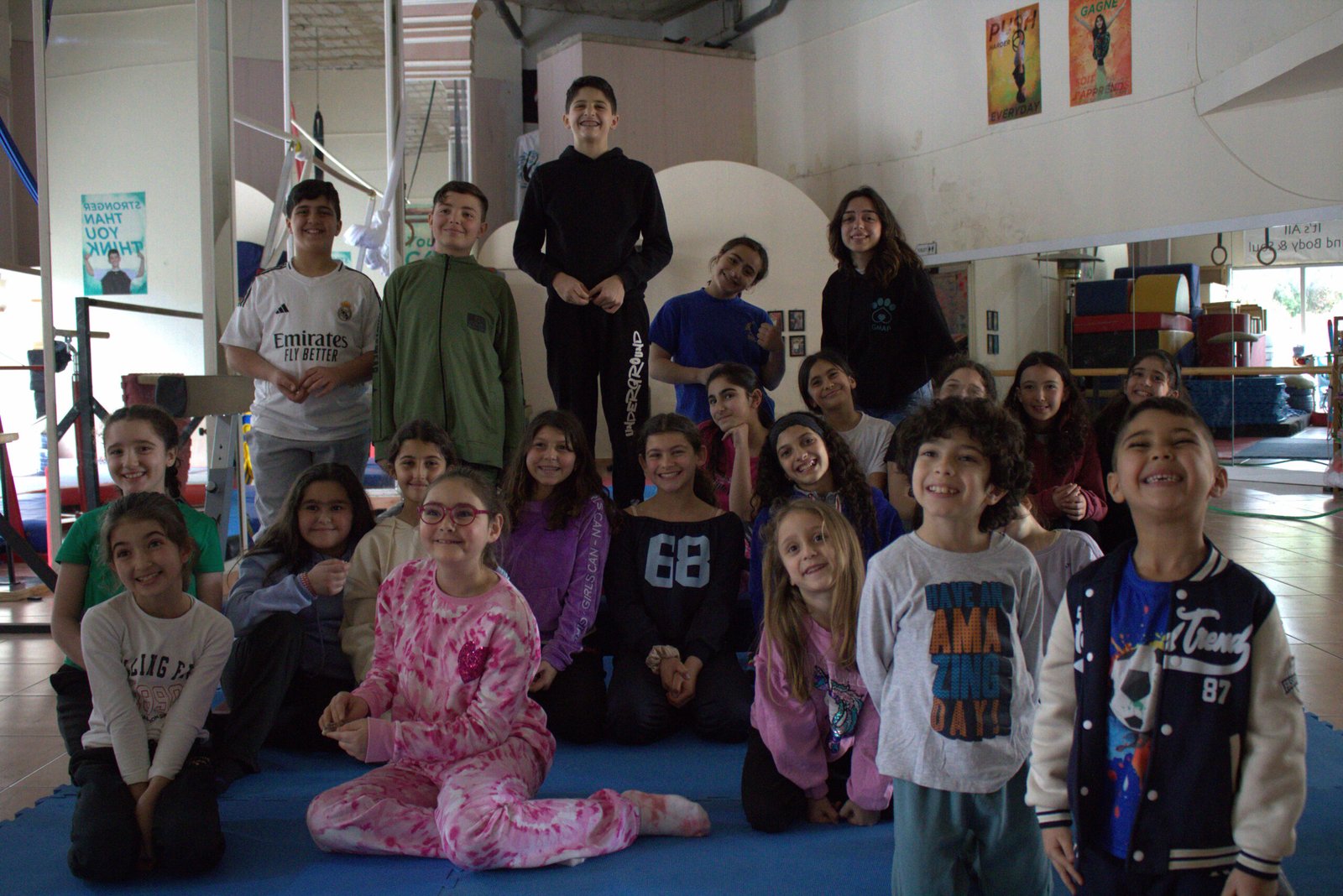 Group photo of circus students at Ciela Academy Baakline