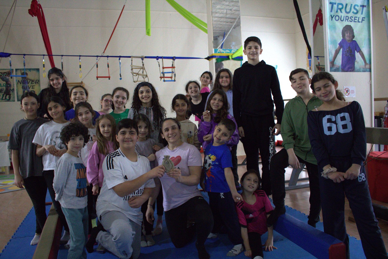 Group photo of circus students at Ciela Academy Baakline