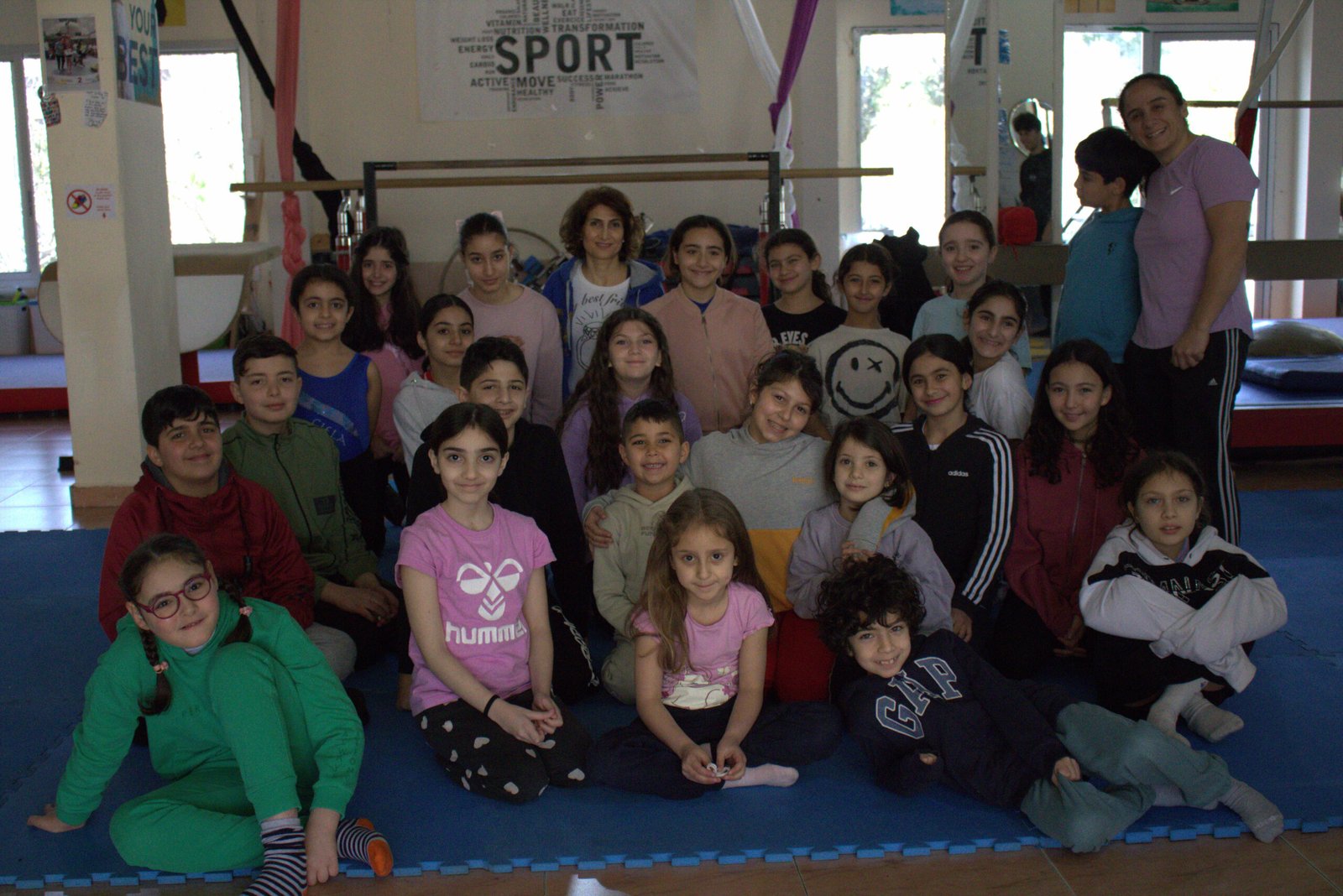 Group photo of circus students at Ciela Academy Baakline